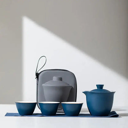 Blue glaze porcelain travel teapot set with two cups