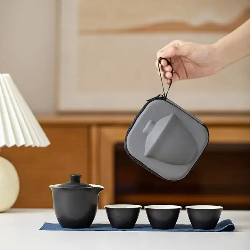 Minimalist porcelain teapot set detail showing spout and lid