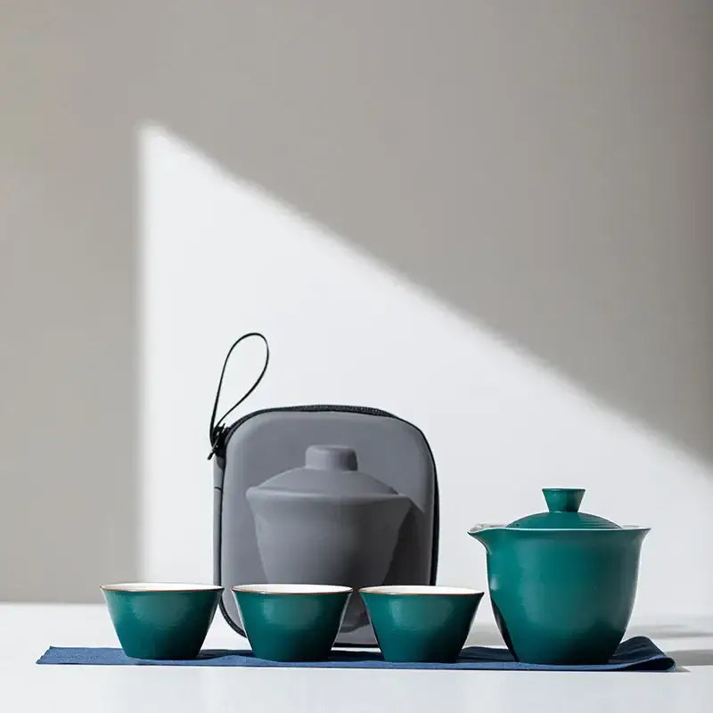 Green glaze portable porcelain teapot set with two cups