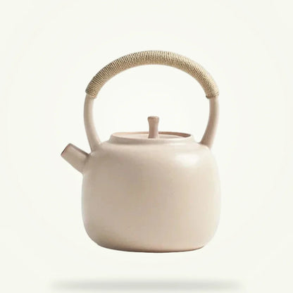 Nordic ceramic teapot 750ml in cream on a plain background, front view with lid
