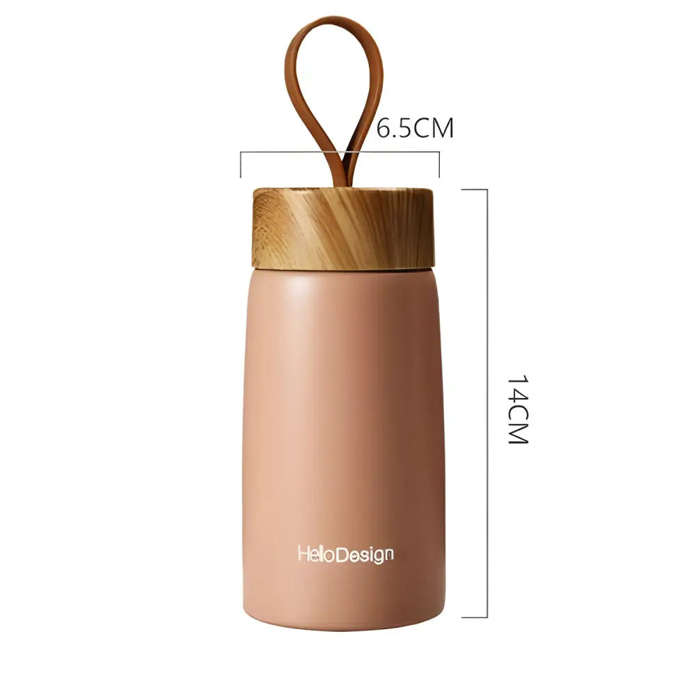 Insulated tea bottle size comparison showing compact 14 cm height