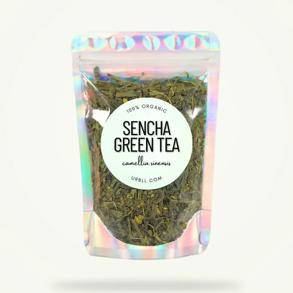 Organic Japanese sencha green tea pouch by Granny Lulu on plain background
