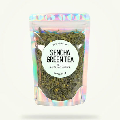 Organic Japanese sencha green tea pouch by Granny Lulu on plain background