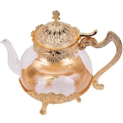 Oriental glass teapot with clear body and zinc handle