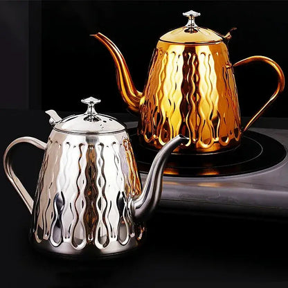 Oriental stainless steel teapot heating on induction cooktop with steam rising
