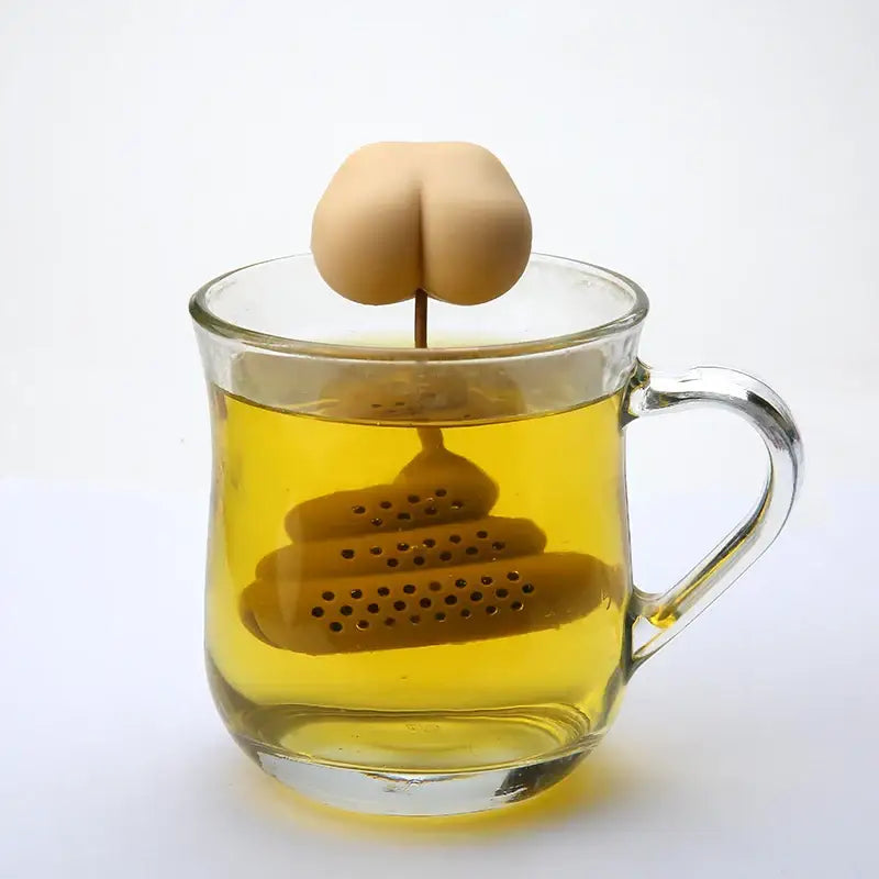 Food-grade silicone poop infuser filled with loose leaf black tea