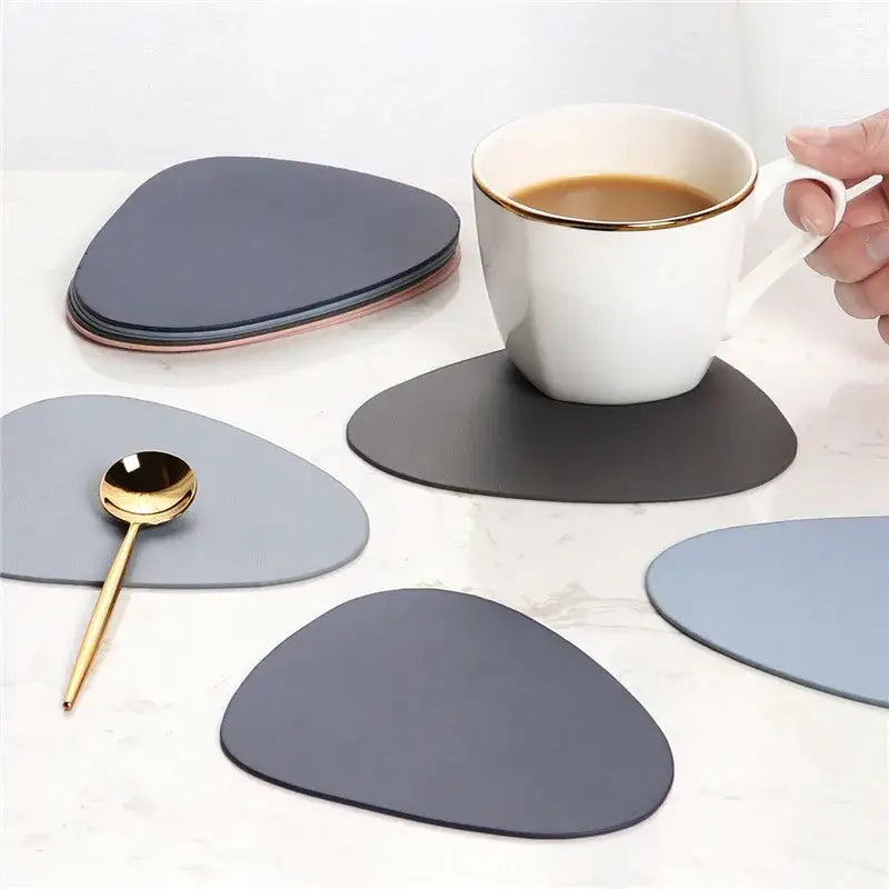 Oval coaster for tea cups in gray