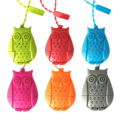 Owl shaped tea infuser sitting on a mug