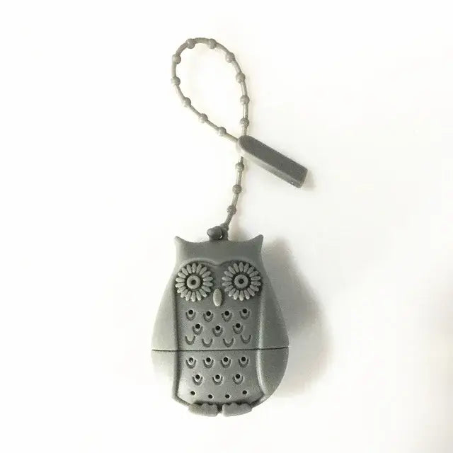 Gray owl tea infuser with tea leaves