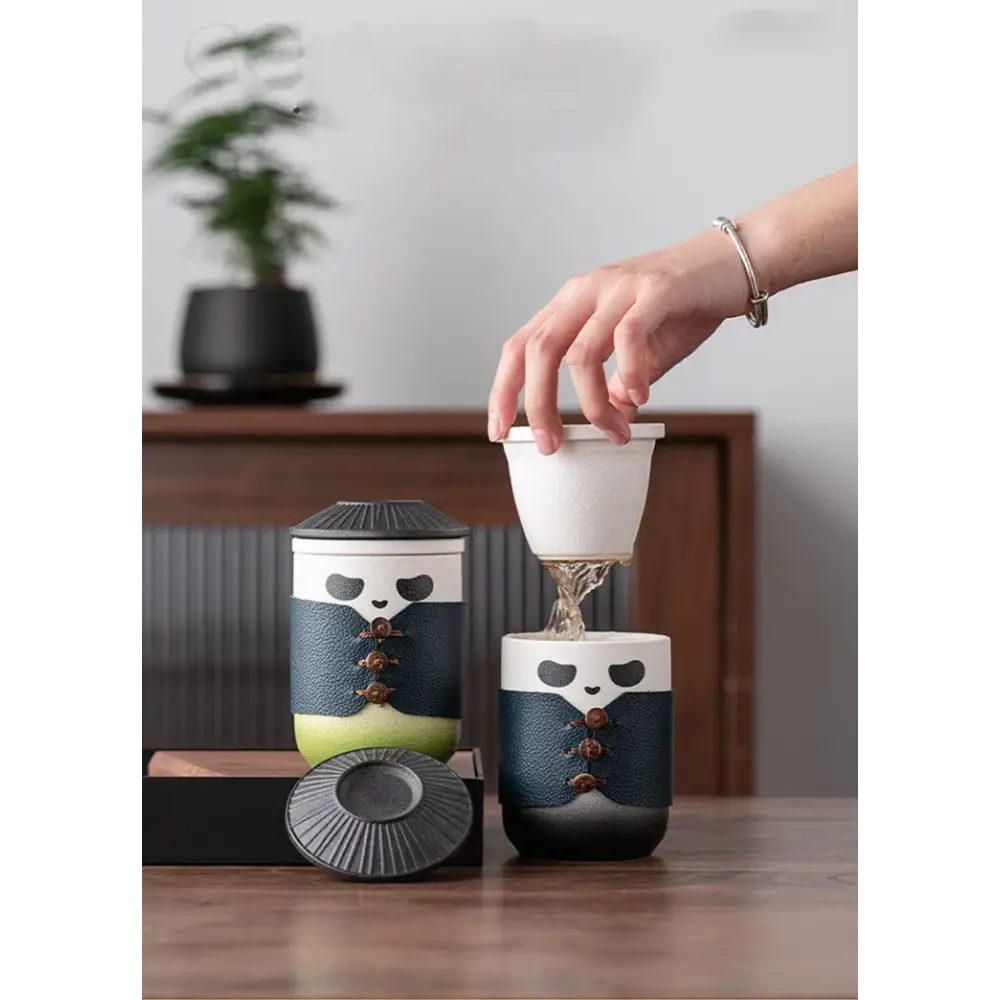 Panda shaped tea strainer on a cup of tea