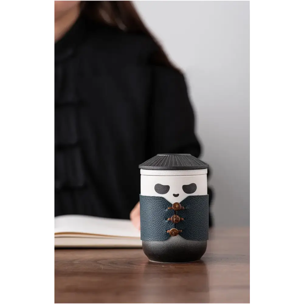 Close up of panda tea infuser with tea leaves
