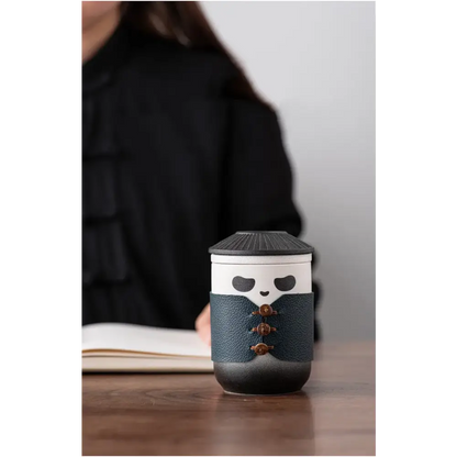 Close up of panda tea infuser with tea leaves
