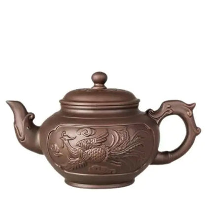Brown Phoenix clay teapot on table