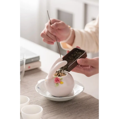 Cute pink rabbit porcelain teapot side view