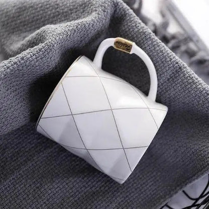 White polygon tea cup filled with tea