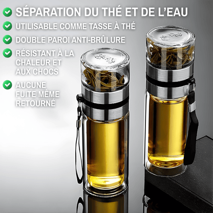 Screw-top lid with silicone seal on portable glass tea infuser bottle, leak-resistant close-up