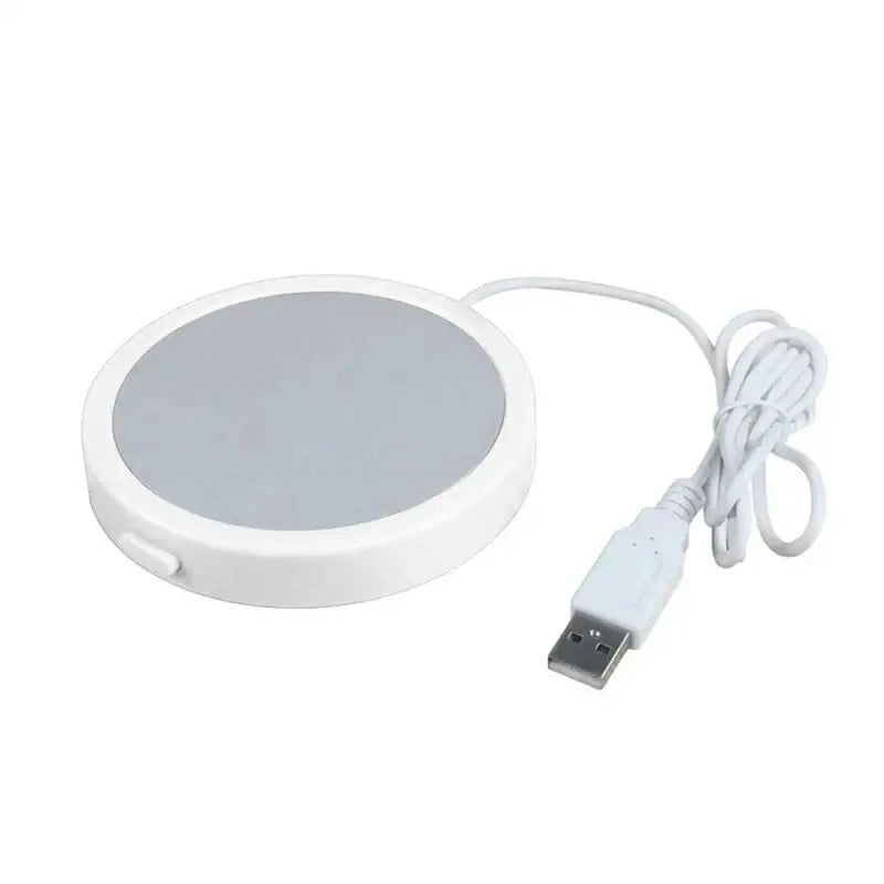 White rechargeable mug warmer with coffee cup