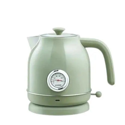 Close-up of retro green electric kettle spout and handle