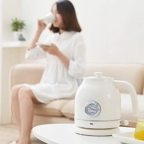 White retro kettle on kitchen counter