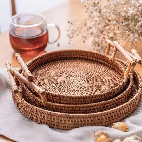 Set of round wicker tea trays stacked