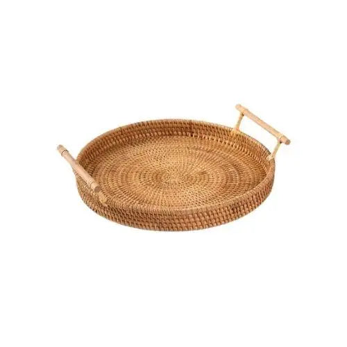 Round wicker tea tray with teapot and cups