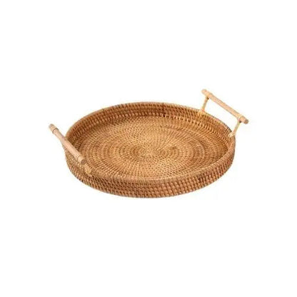 Round wicker tea tray with teapot and cups