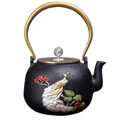 Cast iron teapot with peacock design in black and gold