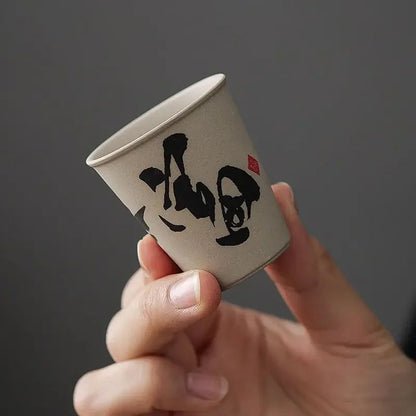 Illustrated wooden keepsake box open with rustic ceramic tea cups inside