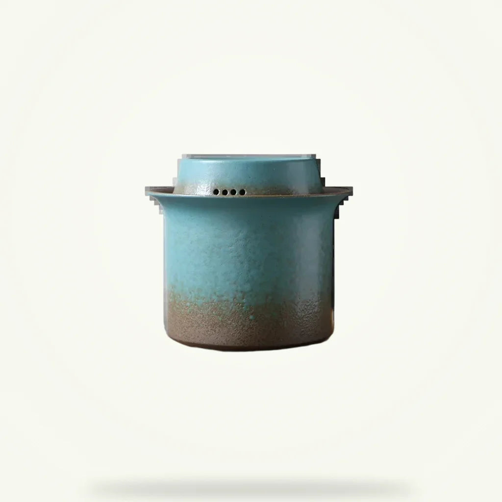 Rustic green ceramic teapot set with gaiwan infuser, 8 pieces on plain background