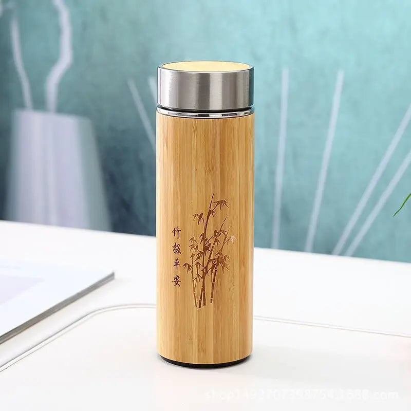Bamboo teapot 450ml side view showing stainless steel interior and built-in infuser