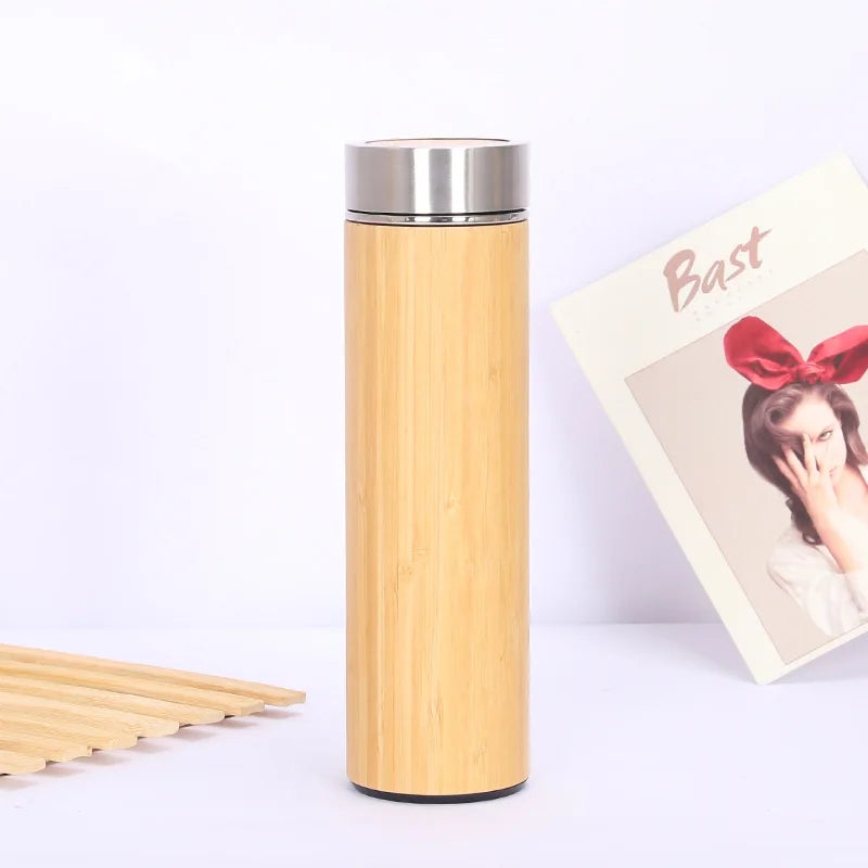 Scandinavian teapot with patterned bamboo exterior and fitted stainless steel lid