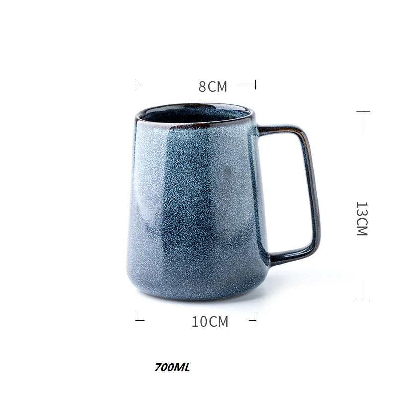 Nordic style teapot overhead shot with scattered tea leaves