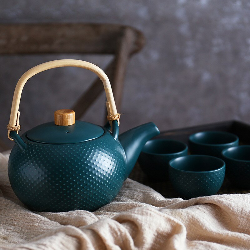 Soft green ceramic teapot 800ml hygge style steam rising close-up