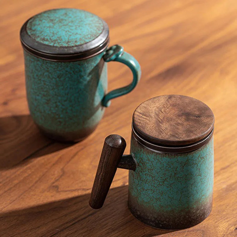 Ceramic teapot with stainless steel infuser on a wooden table, natural light