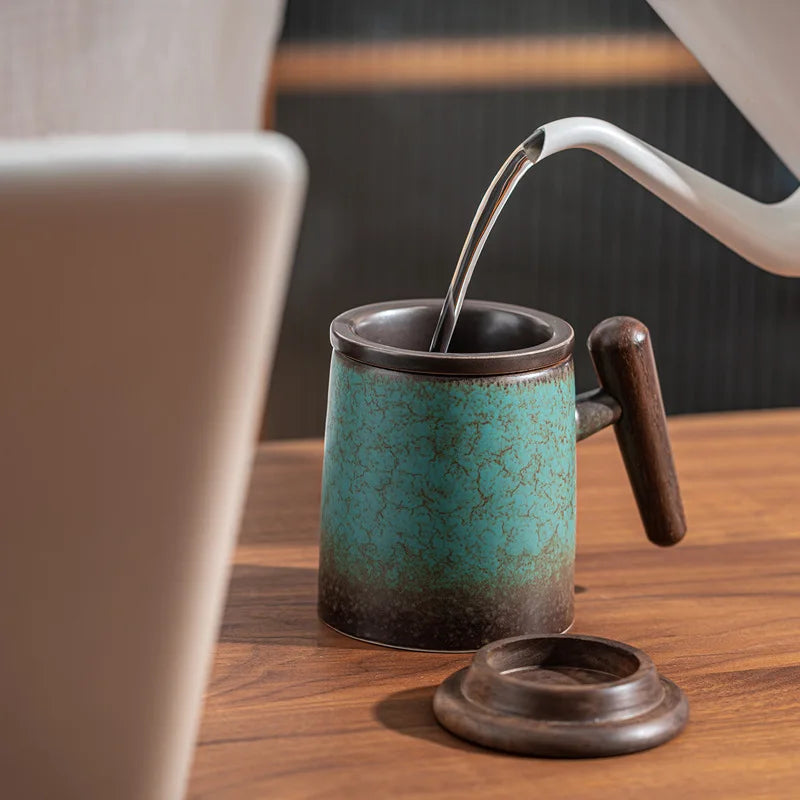 Scandinavian ceramic teapot with infuser in a cozy hygge kitchen setting