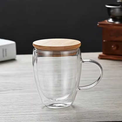 Minimalist double wall glass teapot with glass lid on white background
