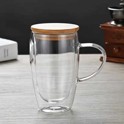 Scandinavian glass teapot with bamboo lid, natural material contrast detail