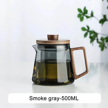 Minimalist borosilicate teapot on a light wood tray, Scandinavian kitchen styling