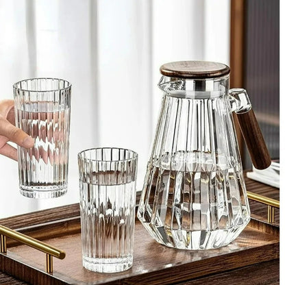 Minimalist clear glass teapot 1.7 liter with infuser, side view showing clean lines