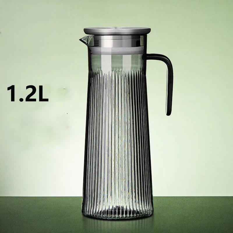 Clear glass teapot with removable stainless steel infuser and tea cup