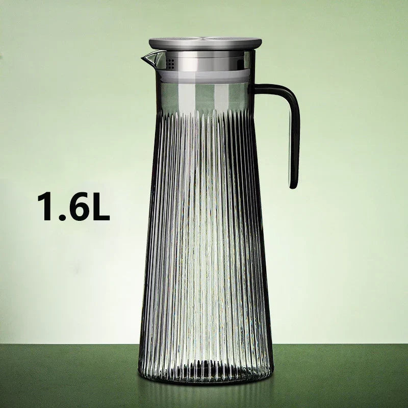 1.6 liter glass teapot filled with brewed tea, top view
