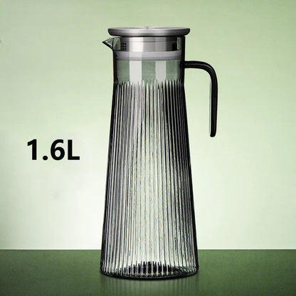 1.6 liter glass teapot filled with brewed tea, top view