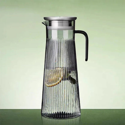 Borosilicate glass teapot brewing green tea, side view