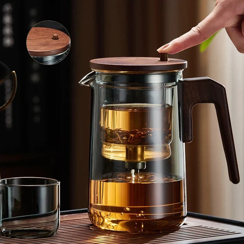 Loose leaf tea steeping inside the Scandinavian glass teapot infuser