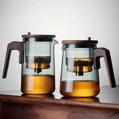 Removable stainless steel infuser basket lifted from the Nordic glass teapot
