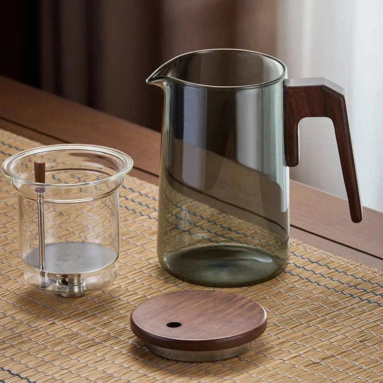 Nordic glass teapot with infuser detail: stainless steel filter basket close-up