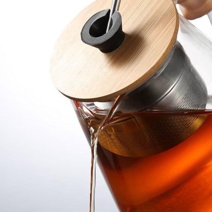 Borosilicate glass teapot with steam rising
