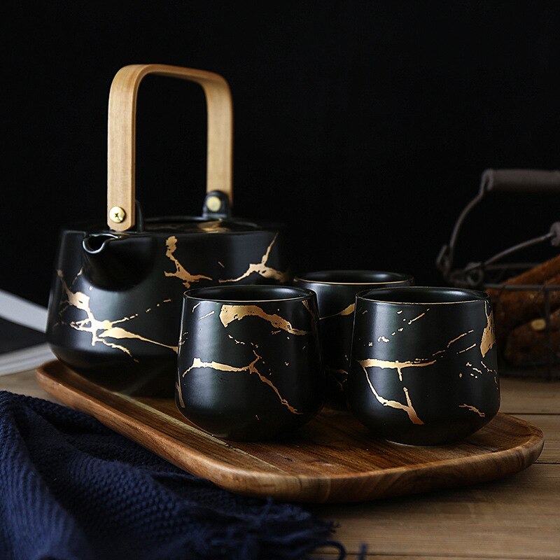 Scandinavian porcelain teapot 1L in White and Gold finish, side view