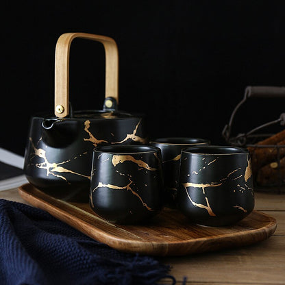Scandinavian porcelain teapot 1L in White and Gold finish, side view
