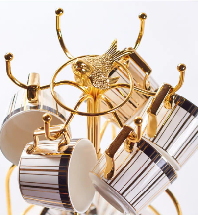 Birdcage cup holder from Nordic design tea set, holding porcelain cups